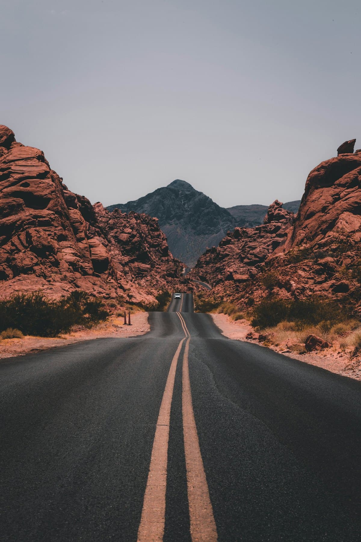 Open road stretching toward distant hills